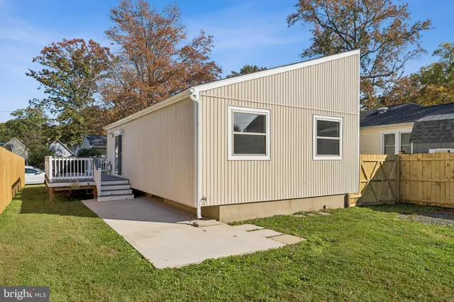a view of backyard with cabin