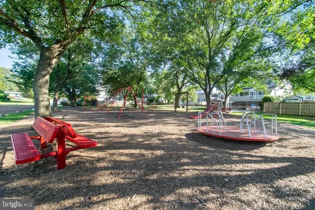 a view of a lake with outdoor space and a lake view