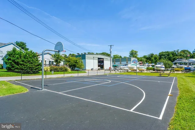 a view of a swimming pool and a yard