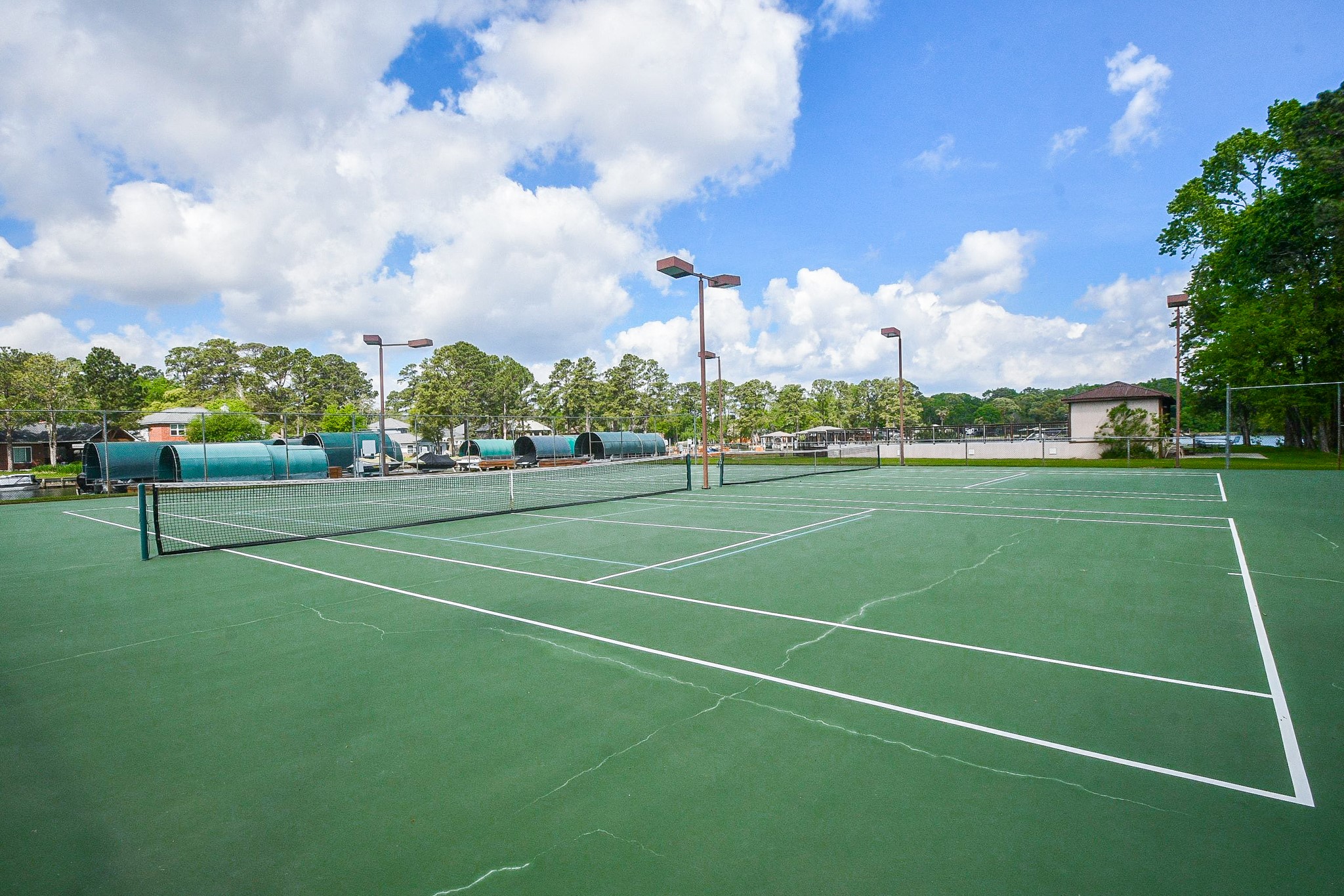 500 River Road, Unit 101 Montgomery, TX 77356 - Photo 21 of 27 Walden Cove's lighted tennis/pickleball courts ready for action anytime