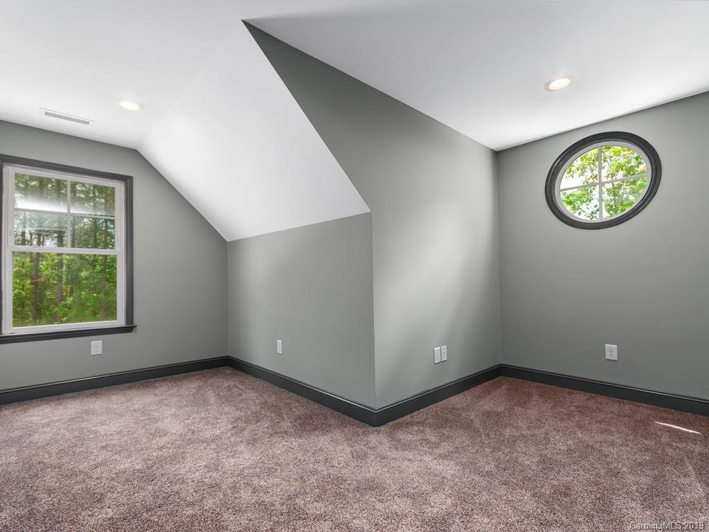 3200 Big Level Road Mill Spring, NC 28756 - Photo 22 of 25 an empty room with windows and entrance