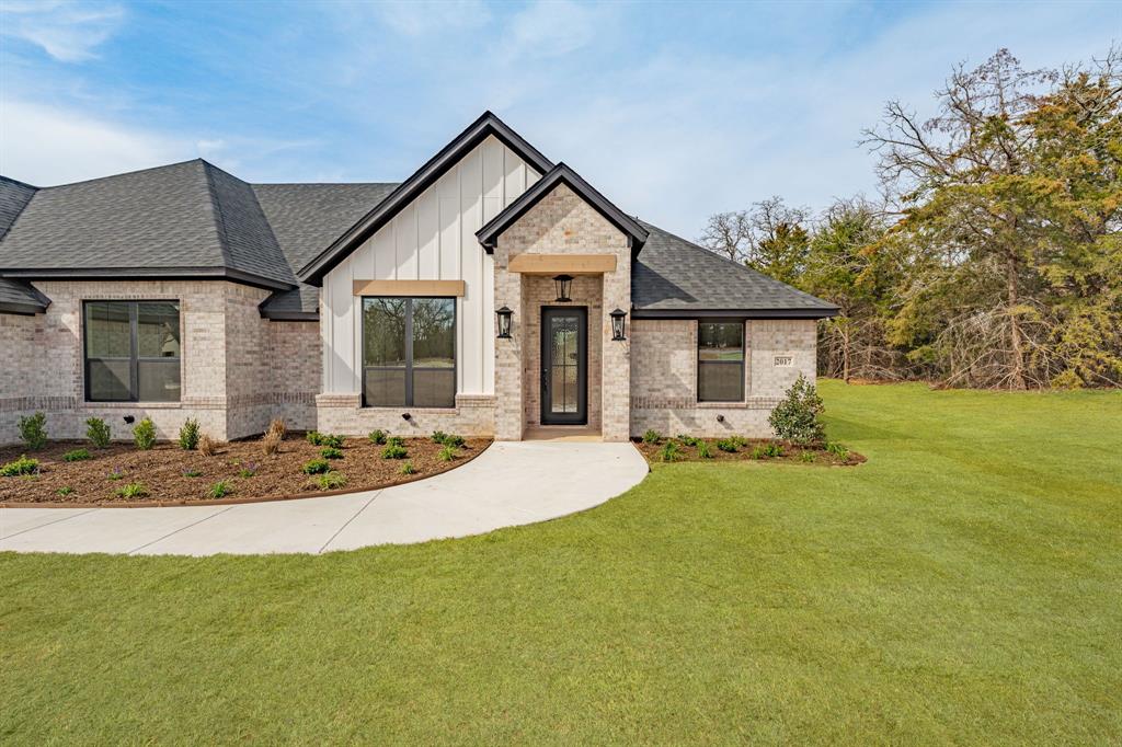 2017 Forest Bridge Azle, TX 76020 - Photo 1 of 30 a front view of house with yard and green space