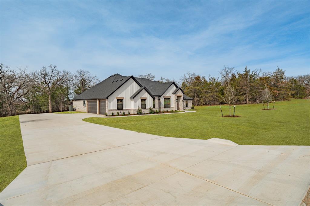 2017 Forest Bridge Azle, TX 76020 - Photo 4 of 30 a view of outdoor space with garden