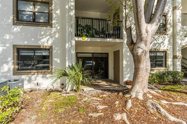 a view of house with yard and outdoor space