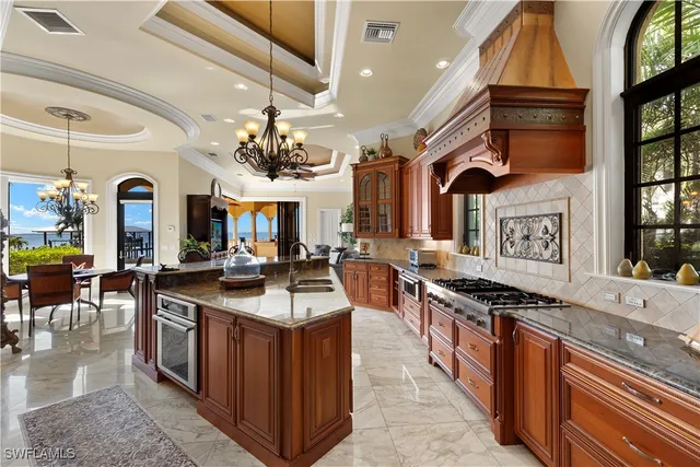 a kitchen with lots of counter top space and appliances