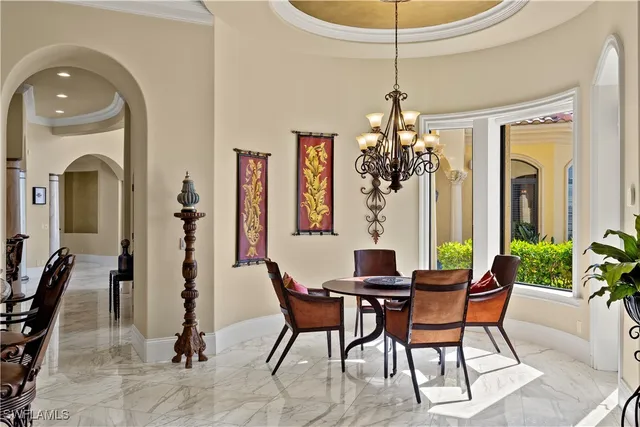 a living room with furniture rug and window