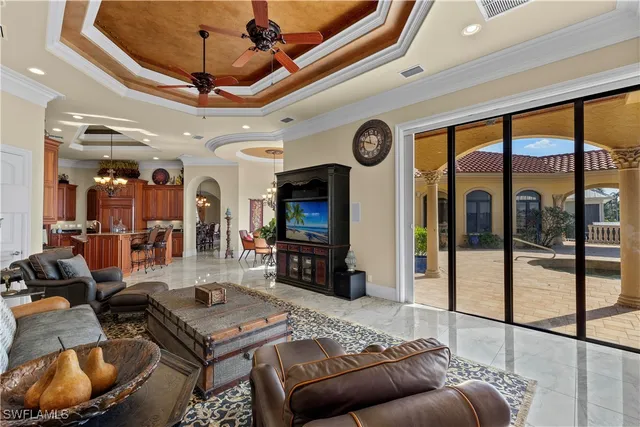 a bedroom with a large bed and a large window