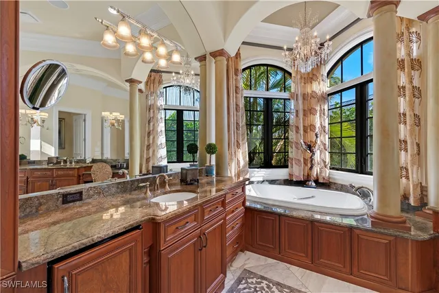 a bathroom with a double vanity sink mirror and toilet