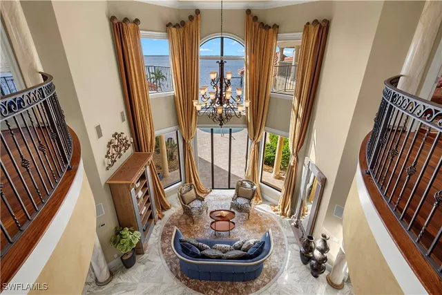 a view of a livingroom with furniture and a flat screen tv