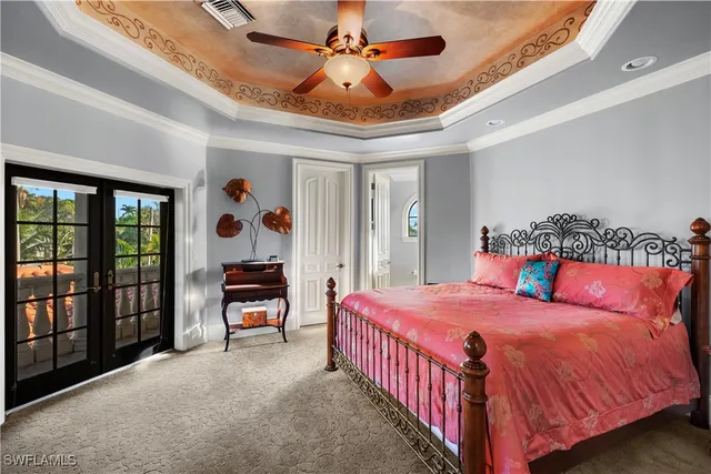 a bathroom with a granite countertop toilet a sink and a mirror