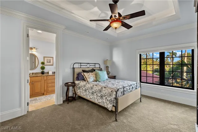 a bathroom with a granite countertop toilet a sink and a mirror
