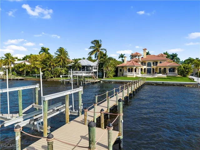 a view of hall way with furniture