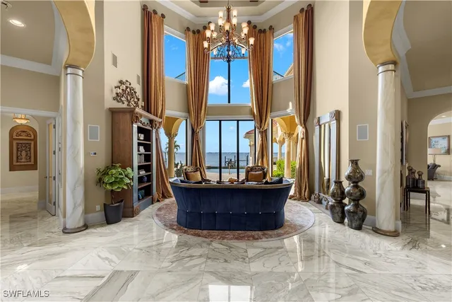 a living room with furniture a rug and a fireplace