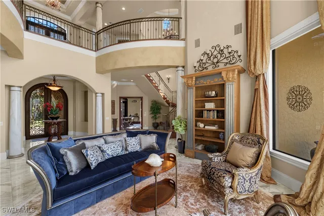 a view of livingroom with furniture and natural light