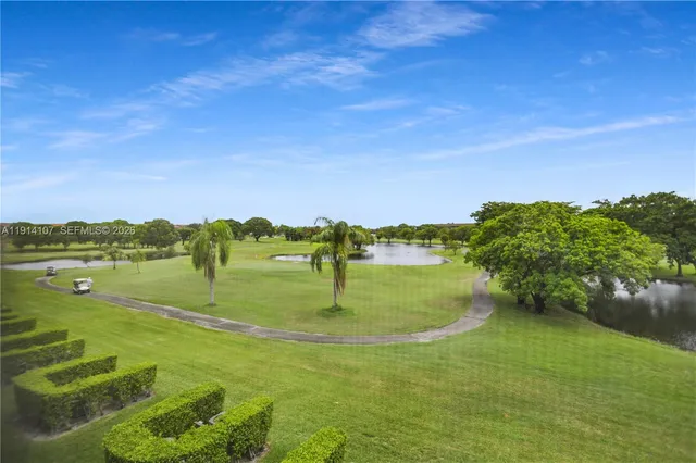 a view of a lake with a big yard
