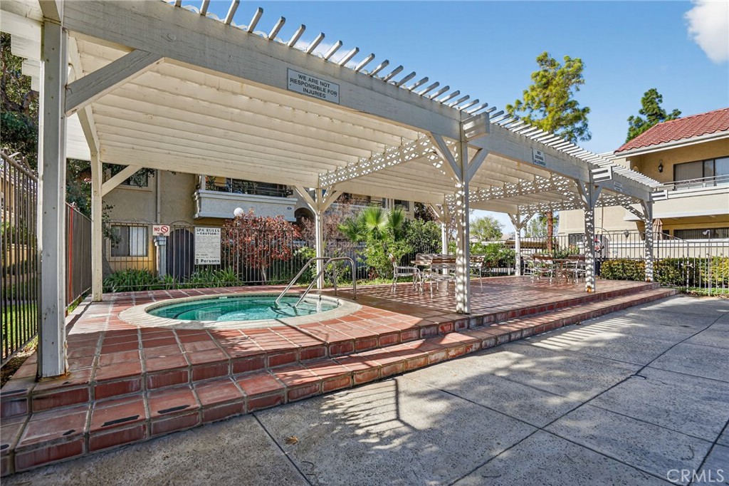 18808 Mandan Street, Unit 309 Canyon Country, CA 91351 - Photo 16 of 19 a view of a building with sitting area