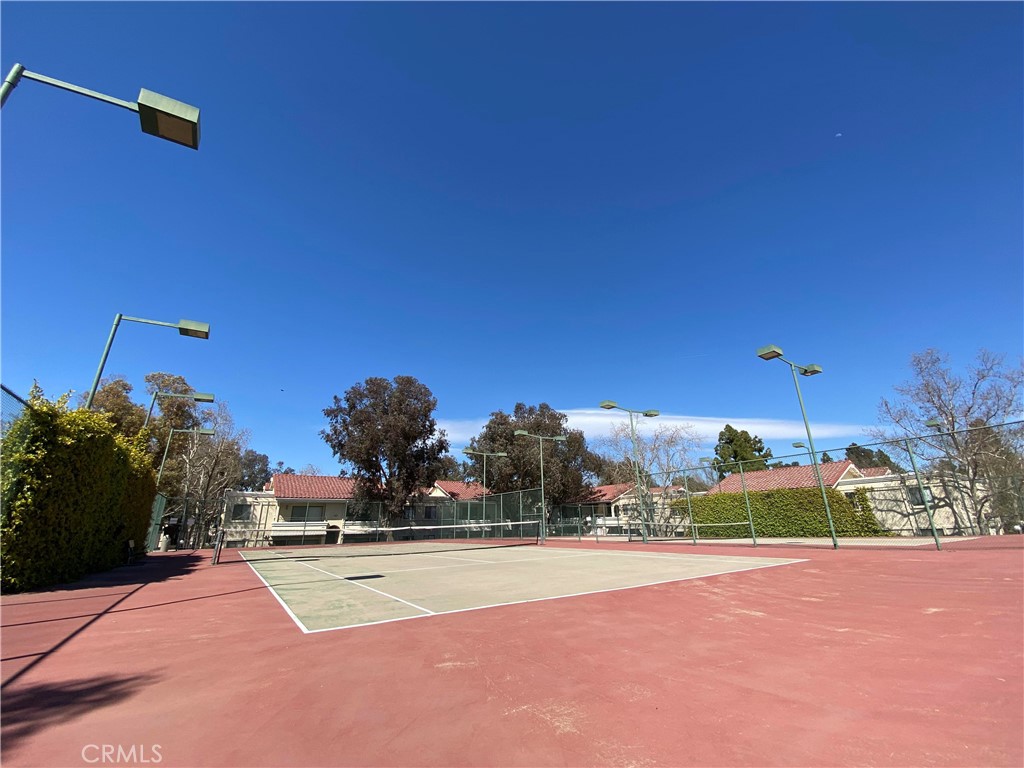 18808 Mandan Street, Unit 309 Canyon Country, CA 91351 - Photo 18 of 19 a view of a tennis court