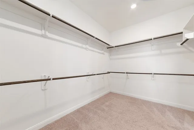 a view of a livingroom with a ceiling fan