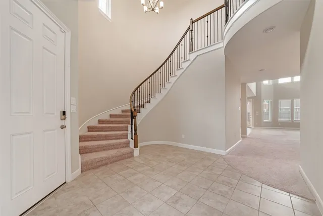 a large kitchen with stainless steel appliances lots of counter top space