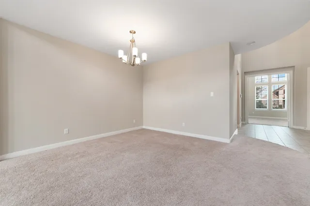 a view of a refrigerator in kitchen
