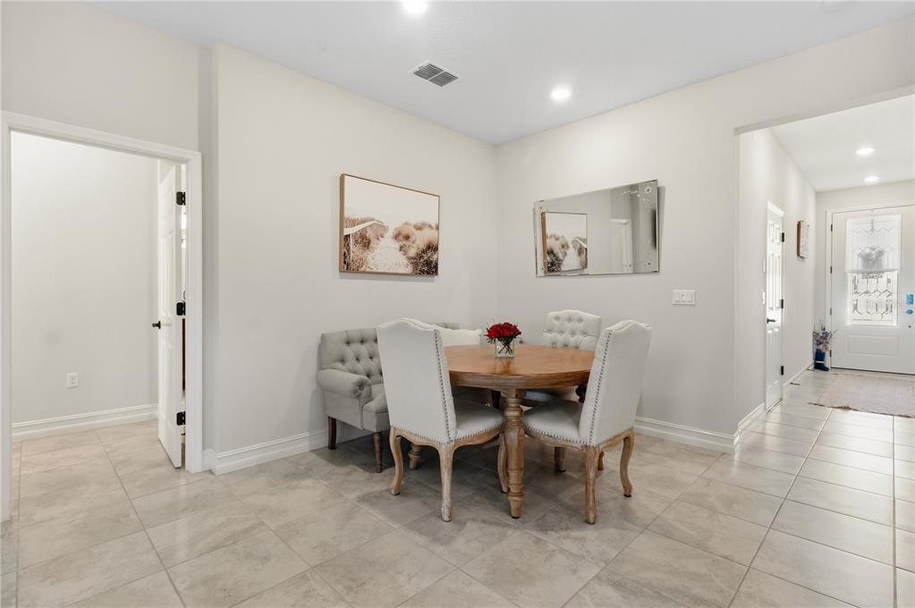 5312 Northwest 33rd Place Ocala, FL 34482 - Photo 9 of 62 a view of a dining room with furniture