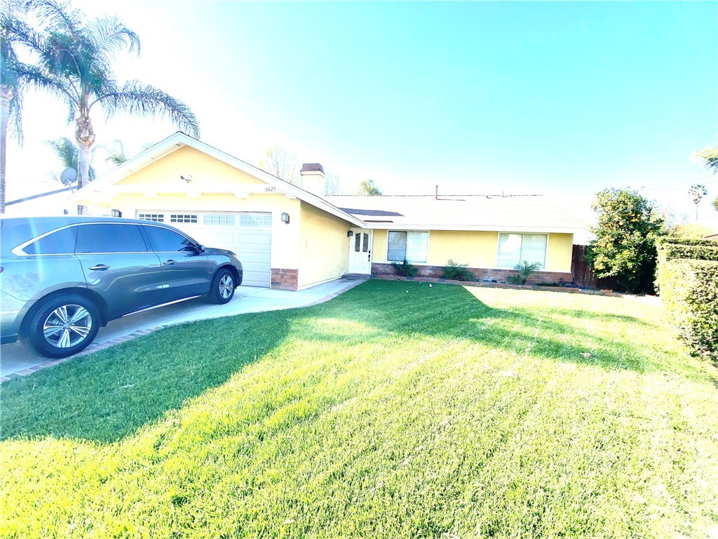 6825 Holbrook Way Riverside, CA 92504 - Photo 1 of 1 a view of a house with a backyard