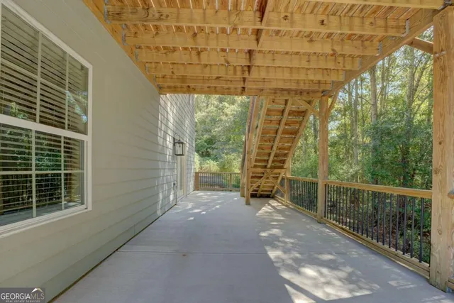 a view of a room with windows