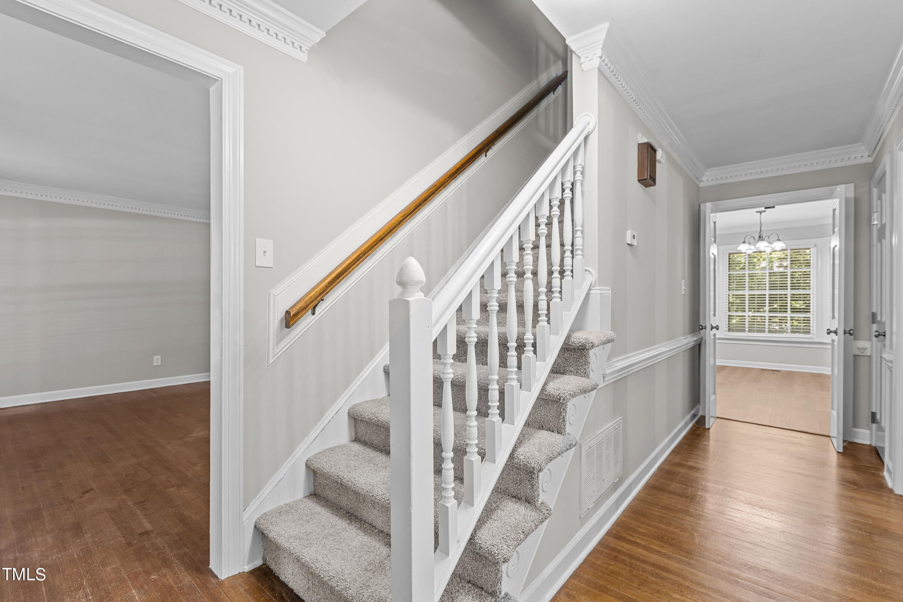 8112 Running Cedar Trail Raleigh, NC 27615 - Photo 10 of 54 Foyer stairs to 2nd floor