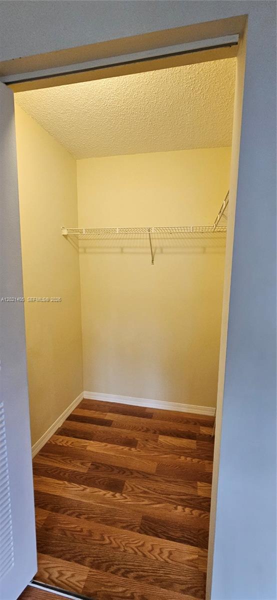3870 Lyons Road, Unit 2098 Coconut Creek, FL 33073 - Photo 26 of 31 Primary Walking Closet