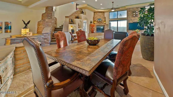 a view of a dining room with furniture and window