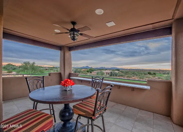 a view of a patio with swimming pool