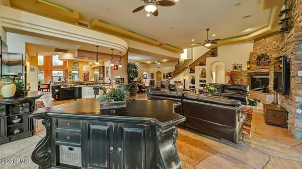 a kitchen with stainless steel appliances granite countertop a stove and cabinets