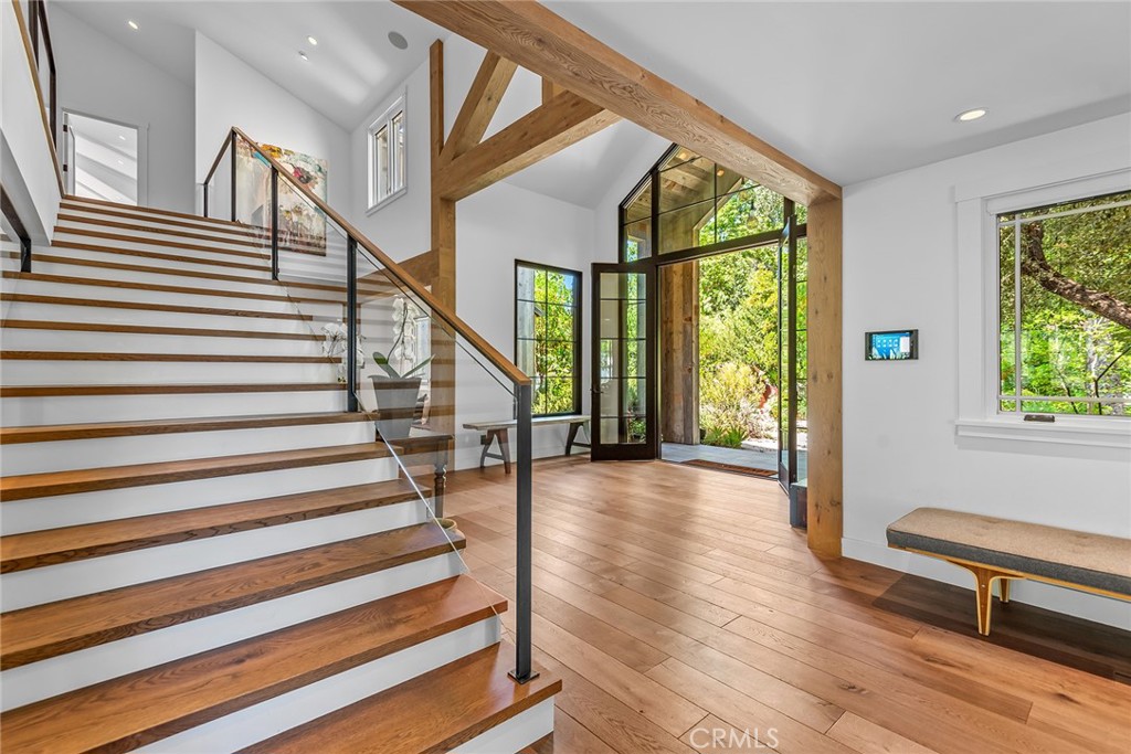 5207 Saddle Creek Road Hidden Hills, CA 91302 - Photo 20 of 54 a view of entryway and hall with wooden floor