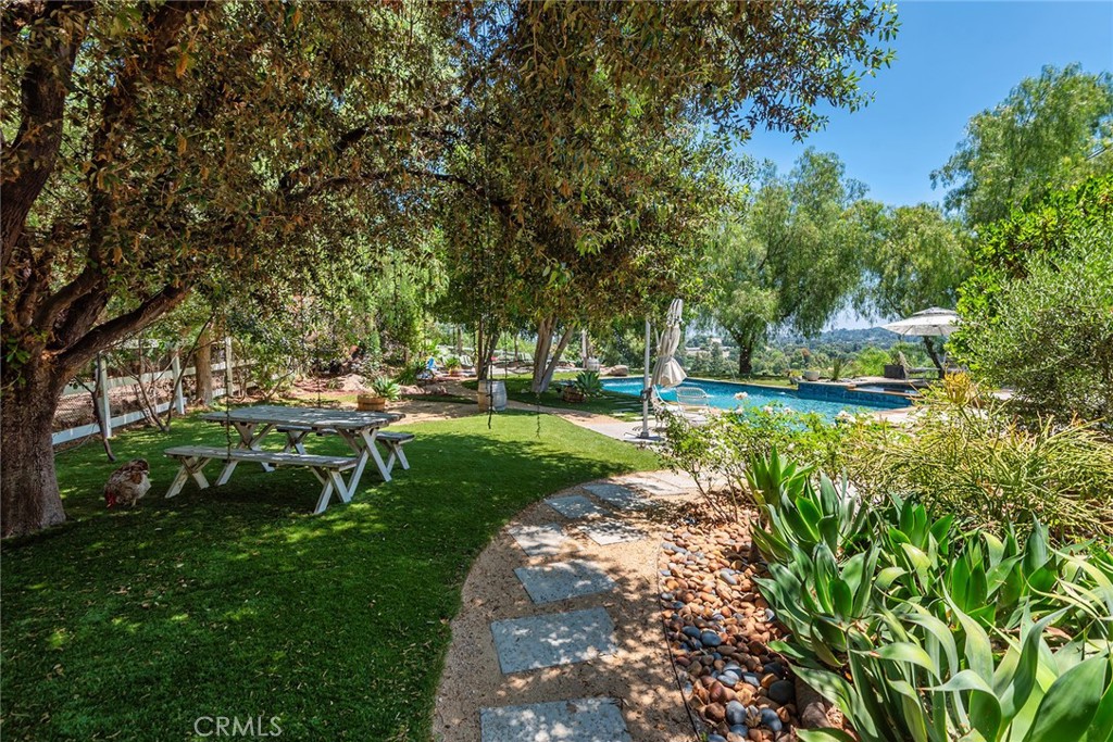 5207 Saddle Creek Road Hidden Hills, CA 91302 - Photo 40 of 54 a view of a park with large trees