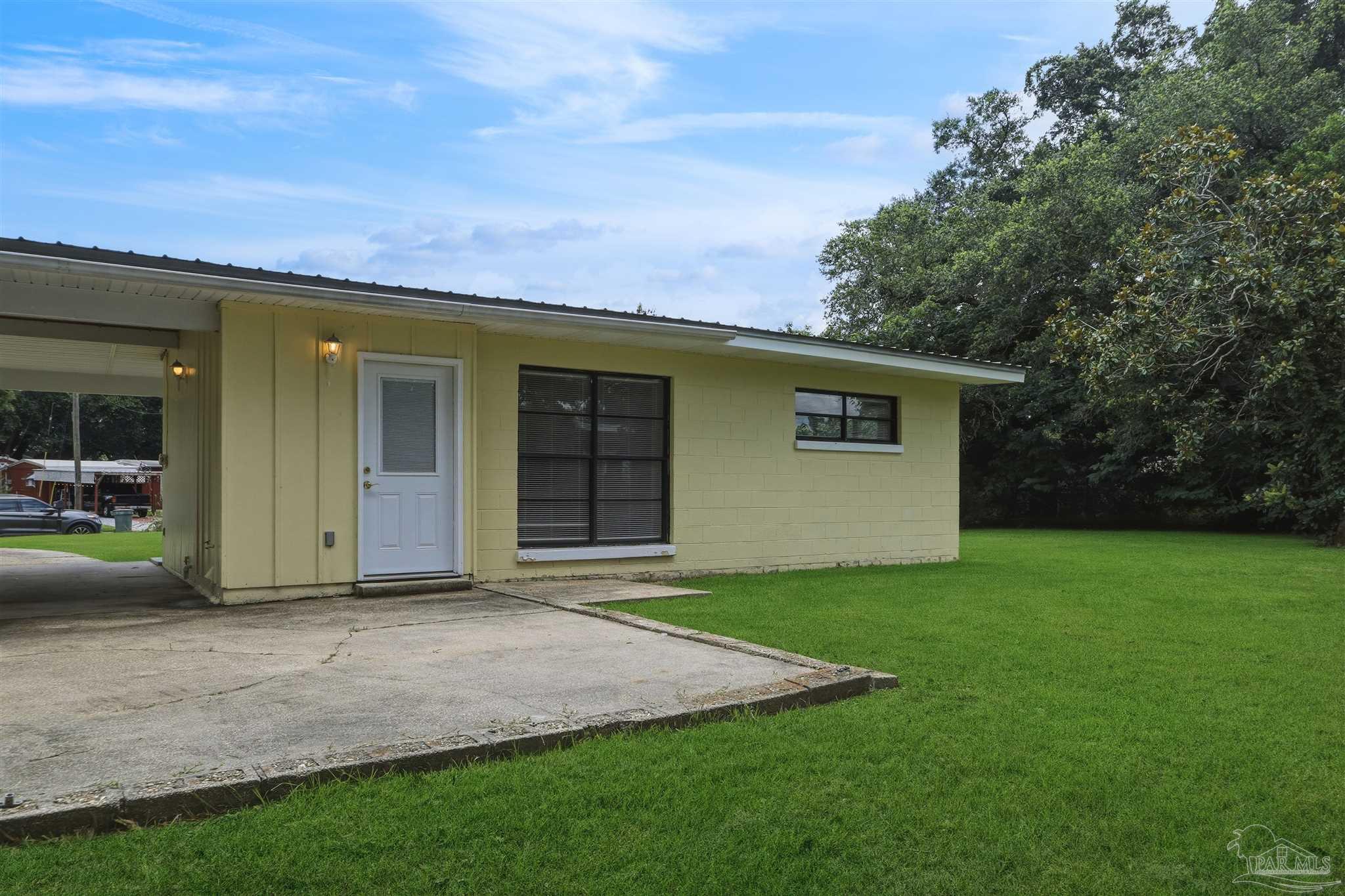 101 Vanderbilt Road Pensacola, FL 32506 - Photo 33 of 33 Rear exterior, carport and entry