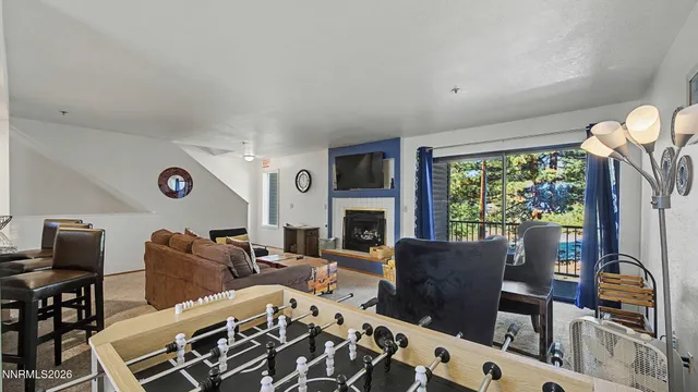 a bathroom with a toilet sink and window