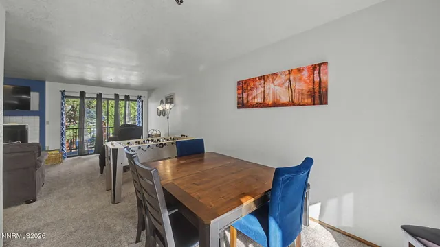 a view of livingroom with furniture and window