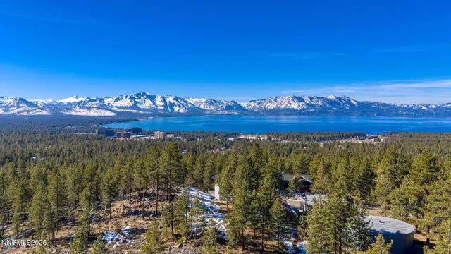 a view of a city with mountains in the background