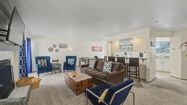 a view of a workspace with furniture