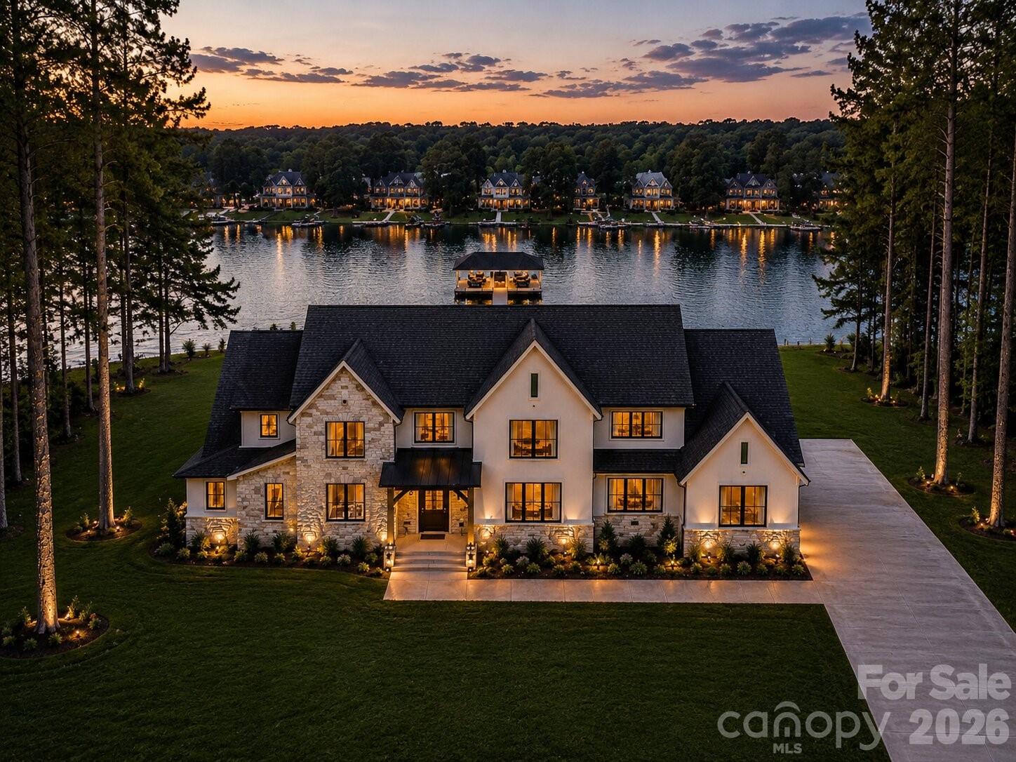 515 Kemp Road Mooresville, NC 28117 - Photo 1 of 34 a front view of house with yard and lake view