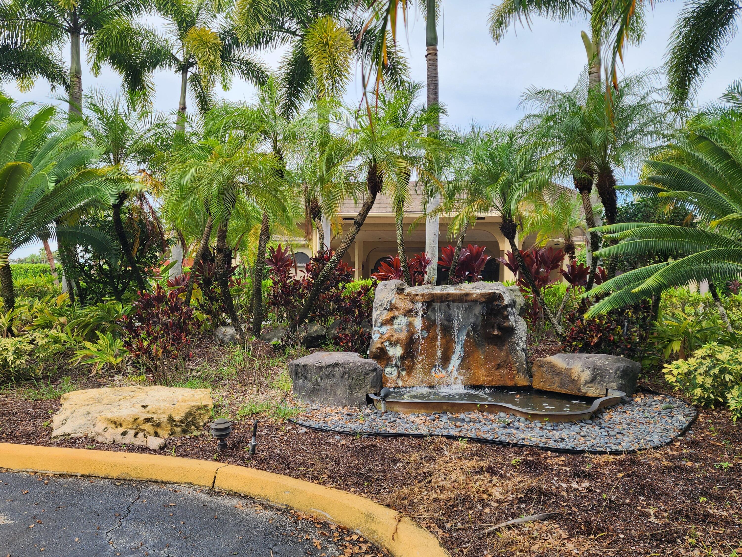 3755 Via Poinciana, Unit 607 Lake Worth, FL 33467 - Photo 17 of 19 a view of a outdoor space