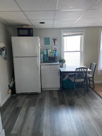 41 Winter Street, Unit 2R Fitchburg, MA 01420 - Photo 1 of 13 a workspace with wooden floor and a sink