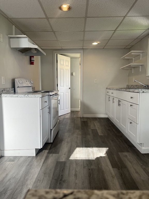 41 Winter Street, Unit 2R Fitchburg, MA 01420 - Photo 2 of 13 a kitchen with a sink and cabinets