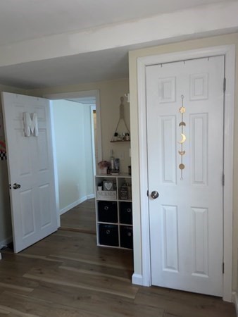 41 Winter Street, Unit 2R Fitchburg, MA 01420 - Photo 6 of 13 wooden floor and closet in a room