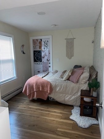 41 Winter Street, Unit 2R Fitchburg, MA 01420 - Photo 8 of 13 a bedroom with a bed window and dresser