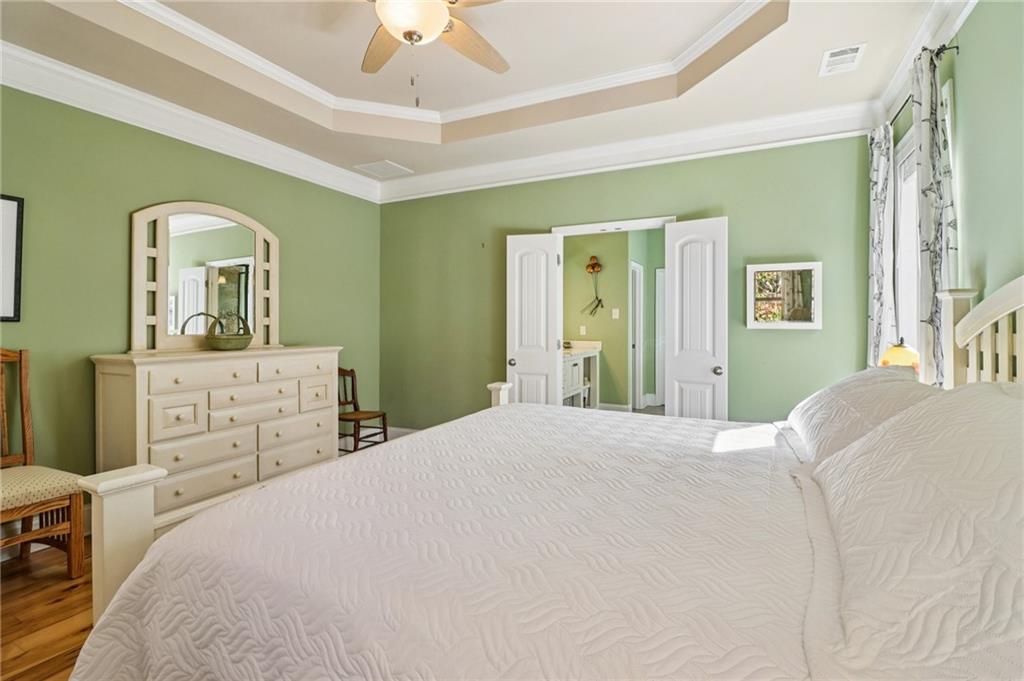 2007 Eagles Ridge Waleska, GA 30183 - Photo 13 of 45 a bedroom with a bed and a dresser