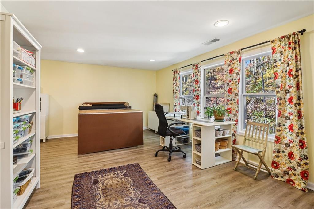 2007 Eagles Ridge Waleska, GA 30183 - Photo 20 of 45 a workspace with furniture rug and wooden floor