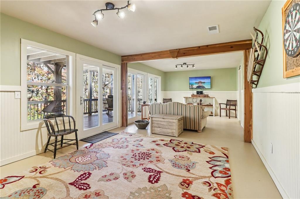 2007 Eagles Ridge Waleska, GA 30183 - Photo 24 of 45 a bedroom with furniture and a rug