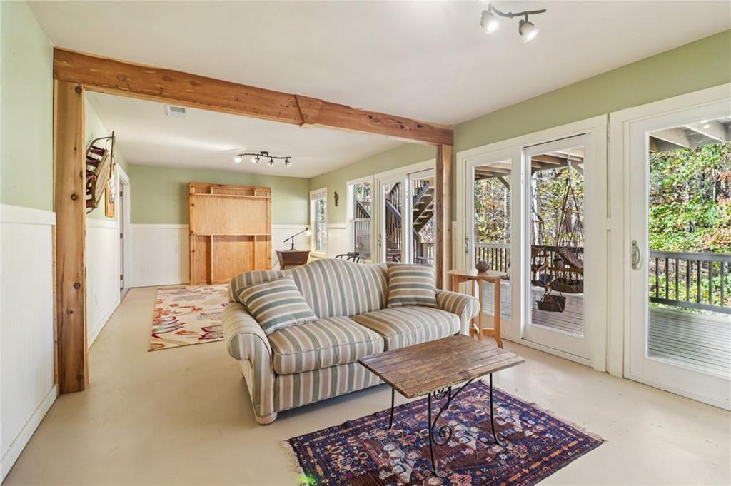 2007 Eagles Ridge Waleska, GA 30183 - Photo 25 of 45 a living room with furniture and a rug