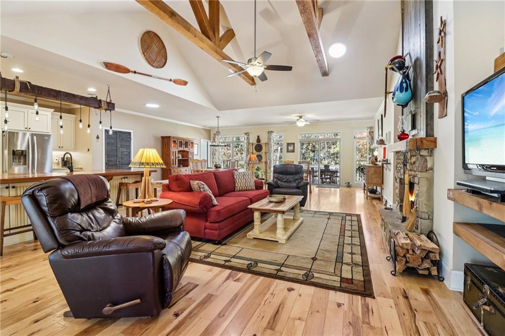 2007 Eagles Ridge Waleska, GA 30183 - Photo 6 of 45 a living room with furniture and a flat screen tv